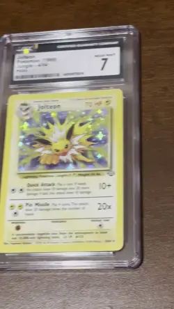 Pokemon TCG Jolteon 4/64 Jungle Unlimited Holo Rare CGC 7 Near Mint - Image 2