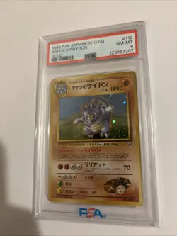 PSA 8 Brock's Rhydon 1998 Gym Heroes Japanese 112 Holo Pokemon Card With Swirl - Image 2
