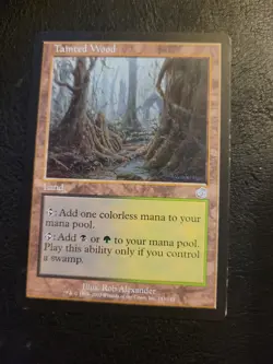 Torment #143 Tainted Wood MTG Magic The Gathering Green Black Land Uncommon LP - Image 1