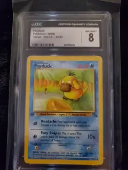 1999 Pokemon Fossil 1st Edition Psyduck #53/62 CGC 8 NM/Mint - Vintage WOTC - Image 1