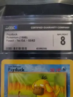 1999 Pokemon Fossil 1st Edition Psyduck #53/62 CGC 8 NM/Mint - Vintage WOTC - Image 2