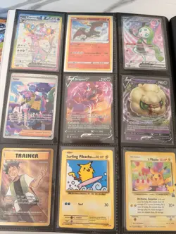 Pokemon TCG 143 mixed card lot with binder - Image 1