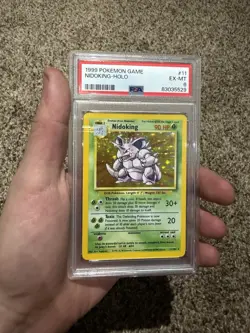 1999 POKEMON BASE SET UNLIMITED #11 NIDOKING-HOLO PSA 6 - Image 1