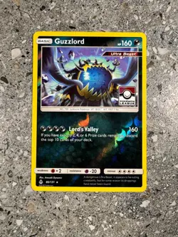 Pokemon TCG Cards Guzzlord 80/131 Forbidden Light Reverse Holo League Promo - Image 1