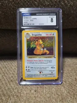 CGC 8 Dragonite 1999 Fossil 1st Edition 4/62 Holo Pokemon Card - Image 1