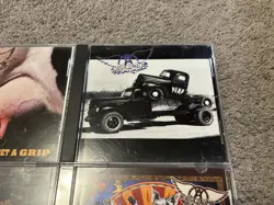 Lot of 4 Aerosmith Rock CD Lot Get A Grip, Pump, Honkin On Bobo, Nine Lives - Image 3