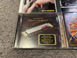 Lot of 4 Aerosmith Rock CD Lot Get A Grip, Pump, Honkin On Bobo, Nine Lives - Image 4