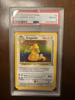 Pokemon Fossil Dragonite Holo Unlimited PSA 8 4/62 - Image 1