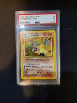 PSA 7 Charizard 4/102 Base Set Rare Holo Pokemon Card 1999 WOTC - Near Mint - Image 1
