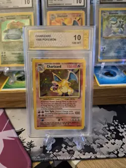 PGC Grade 10 Base Set Charizard 4/102 Holo Rare Pokemon Card 1999 - Image 4