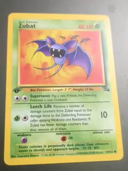 ZUBAT 1999 POKEMON ORIGINAL FOSSIL 1ST EDITION COMMON A 57/62 LP - Image 1