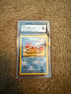 Krabby 51/62 Fossil 1st edition Pokemon TCG CGC 8.5 - Image 1