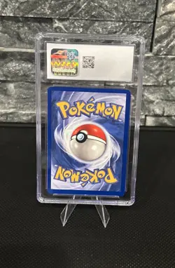 CGC 10 Krabby 51/62 Fossil 1st Edition (1999) - Image 2