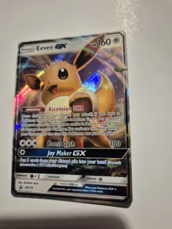 Eevee GX SM174 Sun & Moon Ultra Rare Holo Black Star Promo Pokemon Card - Image 1