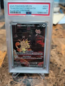 Team Rocket's Meowth 203/182 Sv10: Destined Rivals Holo PSA 9 - Image 1
