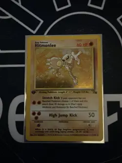 Pokemon TCG 1st edition Hitmonlee 7/62 Fossil Holo Rare Card WOTC MP/LP - Image 1