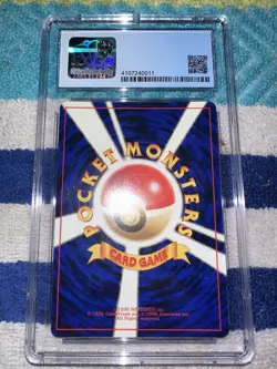 Pokemon Giovanni's Machamp Challenge from the Darkness Holo (Japanese) CGC 8.5 - Image 2