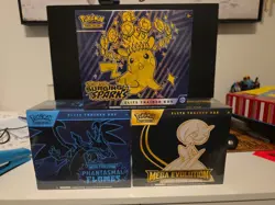 Pokemon Lot Of 3 ETB: Phantasmal Flames, Mega Evolution & Surging Sparks Sealed - Image 1