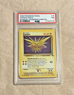 PSA 7 Zapdos Holo Fossil Cosmos Thunderstorm DK. Pokemon TCG - Image 1