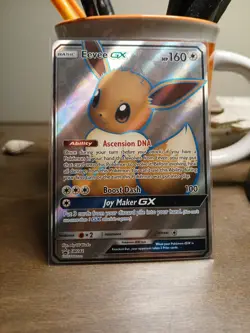 Pokemon TCG Sun & Moon Promo card Eevee GX SM242 Sm Holo - Image 1