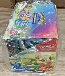 POKEMON TCG PRISMATIC EVOLUTIONS MINI TIN OPEN DISPLAY BOX 8 SEALED TINS - Image 2