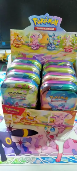X16 Sealed Packs Pokemon TCG Prismatic Evolutions Sealed Mini Tin Display Box - Image 1