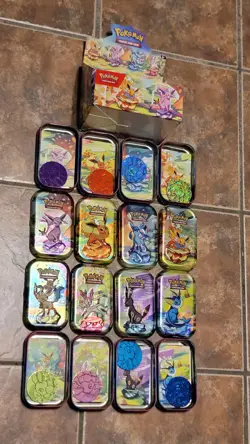 Pokemon TCG Prismatic Evolutions Mini Tin Display Box w/ 8 Tins & Coins NO PACKS - Image 1