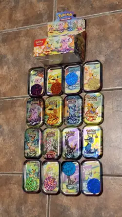 Pokemon TCG Prismatic Evolutions Mini Tin Display Box w/ 8 Tins & Coins NO PACKS - Image 2