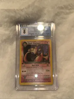 2000 POKEMON 1ST EDITION TEAM ROCKET DARK CHARIZARD HOLO 4/82 CGC 8 - Image 3