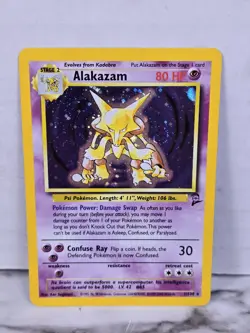 Pokemon TCG Base Set 2 - Alakazam (1/130) Vintage Holo Swirl - Image 1