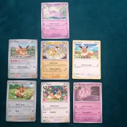 Eevee and Eeveelutions x7 Pokemon Cards Bundle - NM + Cute + Cosmo Holo Jolteon - Image 1
