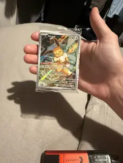 Pokemon TCG Prismatic Evolutions - Eevee Promo SVP-173 (Pokemon Center Stamped) - Image 1