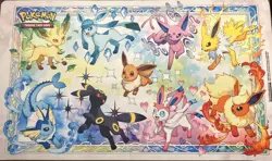 Pokemon Prismatic Evolutions - Eeveelutions Play Mat, New - Image 1