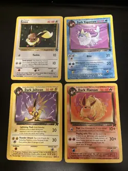Eevee 55/82 Dark Vaporeon 45/82 Dark Jolteon 38/82 Dark Flareon 35/82 HP/DMG Lot - Image 1
