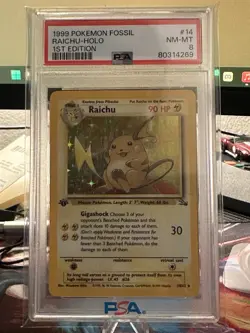 1999 1st Edition Vintage Pokemon Fossil Raichu Holo #14/62 PSA 8 NM-MT - Image 1