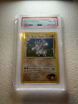 PSA 8 Pokemon Gym Heroes Brock’s Rhydon Holo 2/132 - Image 1