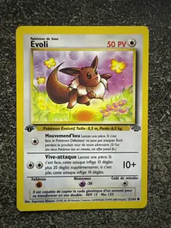 EVOLI COMMUNE - POKEMON 51/64 JUNGLE EDITION 1 NEUF FR - Image 1