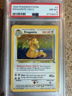 Pokemon Dragonite Holo Rare 4/62 Unlimited Fossil PSA 8 NM-MT - Image 1