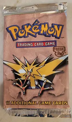 Pokemon Original FACTORY SEALED booster pack FOSSIL - Image 1