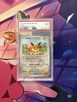 Eevee #074 (Pokemon Day 2025) (Reverse Cosmos Holo) 074/131 PSA 9 - Image 1