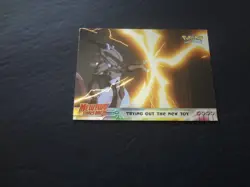 1999 Topps Pokemon the First Movie Trying Out New Toy Silver Foil #7 Blue Logo - Image 1