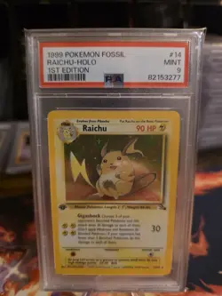 1999 POKEMON TCG RAICHU 14/62 FOSSIL 1ST EDITION HOLO RARE PSA 9 MINT 💎 - Image 1