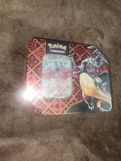 Pokemon TCG: Scarlet & Violet Paldean Fates Charizard EX International Tin - Image 1