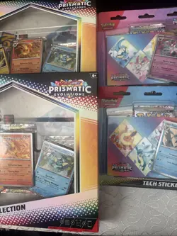 Pokemon Lot Of 4 - Prismatic Evolutions Poster (2)Collection Plus Tech Stickers - Image 1