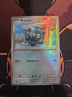 Bronzor 66/131 Pokemon TCG S&V Prismatic Evolutions Pokeball Common Holo NM - Image 1