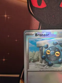 Bronzor 66/131 Pokemon TCG S&V Prismatic Evolutions Pokeball Common Holo NM - Image 2