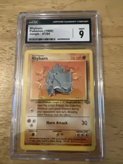 CGC 9 MINT Rhyhorn 1st Edition Jungle 61/64 Pokemon 1999 - Image 1