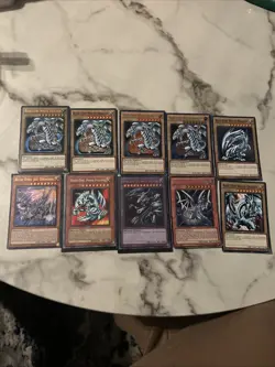 Yu-Gi-Oh! TCG Lot Of 10 Blue Eyes White Dragon And Others With Holographic LP/NM - Image 1