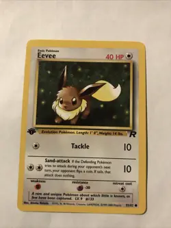 Pokemon TCG Team Rocket 1st Edition Regular Finish Eevee 55/82 NM - Image 1