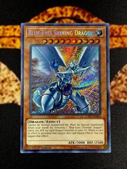 YUGIOH • BLUE EYES SHINING DRAGON • SECRET RARE • LCKC-EN008 • 1st EDITION • NM - Image 1